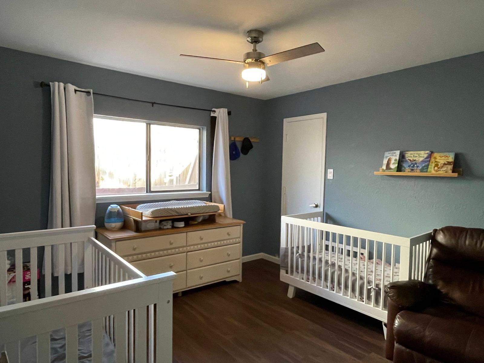 Flex room currently set as a nursery; can be adapted to guest room or office. - 2401 Thistle Ct