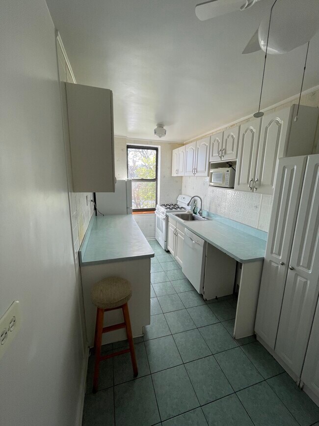 Kitchen view from corner - 67-30 Dartmouth St