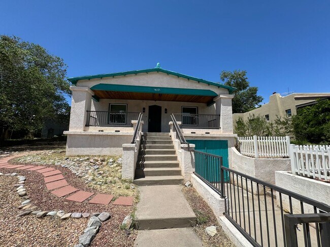 Primary Photo - 4 Br, 2 Ba with kitchen appliances and bas...