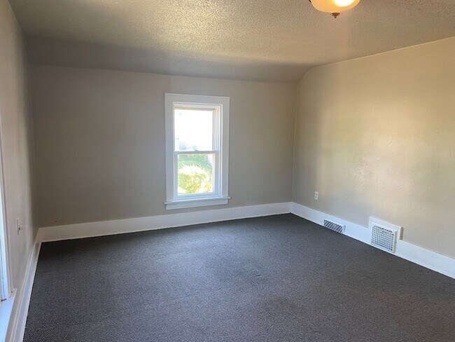 Building Photo - Stylishly Renovated Charming Home on 215 7...