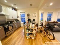 Building Photo - Super Renovated Apt Near NEU!  Laundry in Unit, Spacious and Sunny!