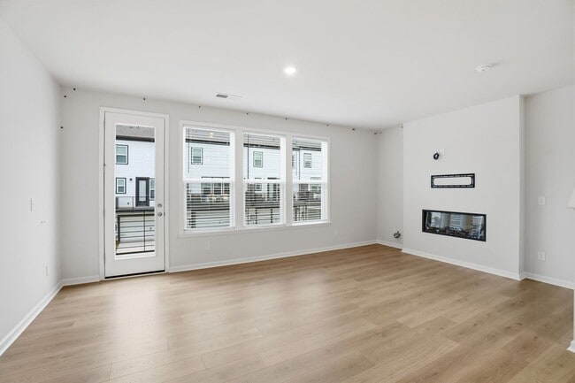 Building Photo - Brand-new three-story townhome in the University area at Senata at Research Park!