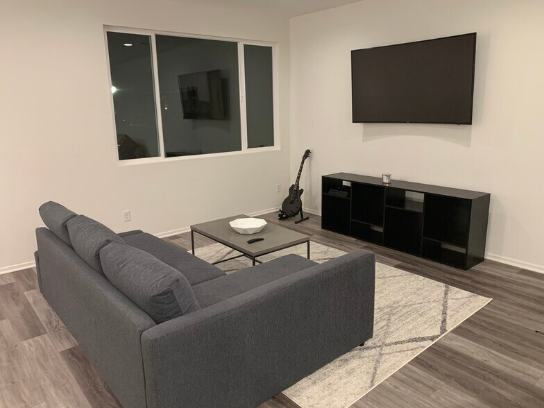 Common living room with access to streaming services and PlayStation 4. Located in 2nd floor Great Room. - 1434 Santa Victoria Road