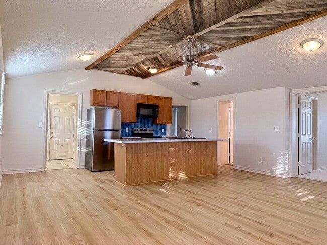 Building Photo - Modern Elegance Meets Location: High Ceilings, Updated Fixtures, Move-In Ready!