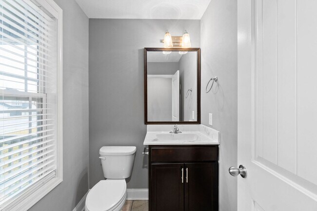 Building Photo - Pet Friendly Three Bedroom with Bonus!