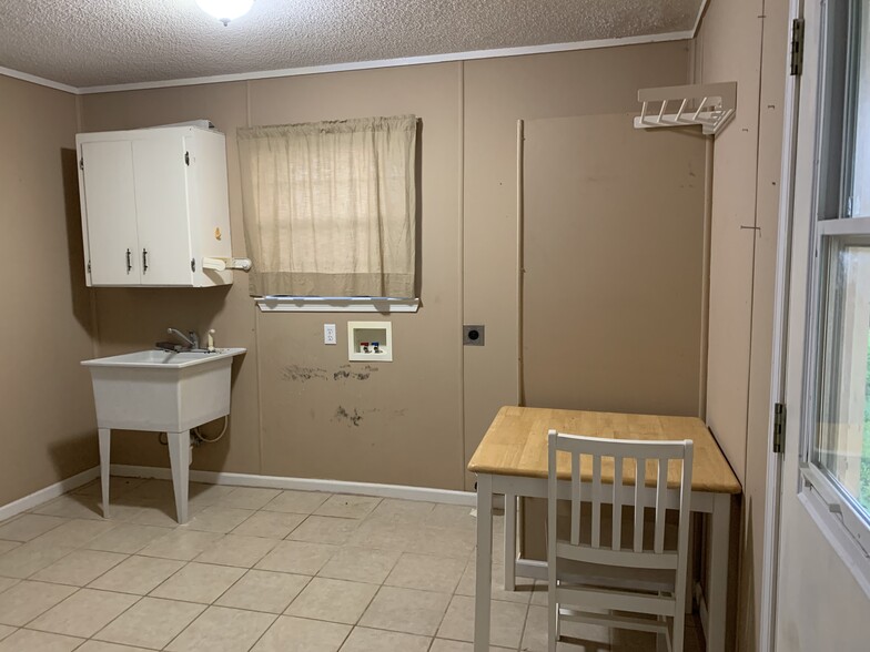 LARGE LAUNDRY ROOM - 8663 Highway 83 N