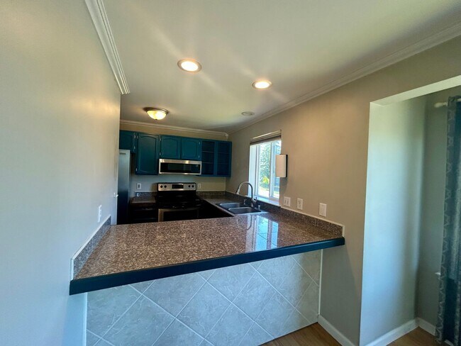 Building Photo - 1028 Billy Frank Jr St #301