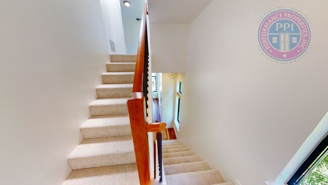 Building Photo - Riverfront Location, Luxury Townhome - End Corner Unit, Two En-Suites, Attached Garage