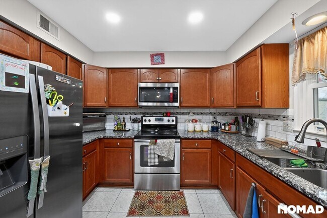 Building Photo - Spacious 4BR House in Germantown