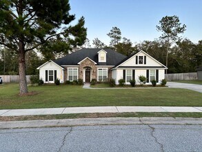 Building Photo - Spacious 4BR/3BA Home with 3-Car Garage, Fireplace & Fenced Yard in Knights Mill