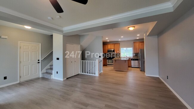 Building Photo - Spacious and Modern 3-Story Townhome - Mol...