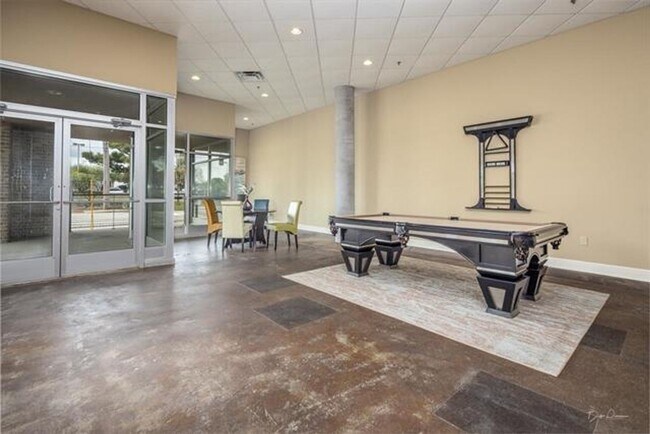 Building Photo - Gorgeous two bedroom two bath with 1574 ft.² two parking spaces included balcony, beautiful rooft...