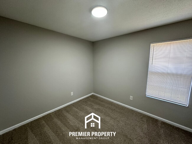 Building Photo - Spacious 4BR/2BA Home in 38141 | Vinyl Flooring & Large Fenced Backyard