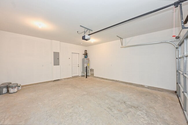 Building Photo - **BE THE LUCKY ONE TO LIVE IN THIS 2024-BUILT TOWNHOME**