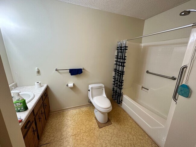 Building Photo - 4-Bedroom Brick Home with Full Unfinished ...