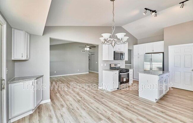 Building Photo - 4927 Triple Tree Ct