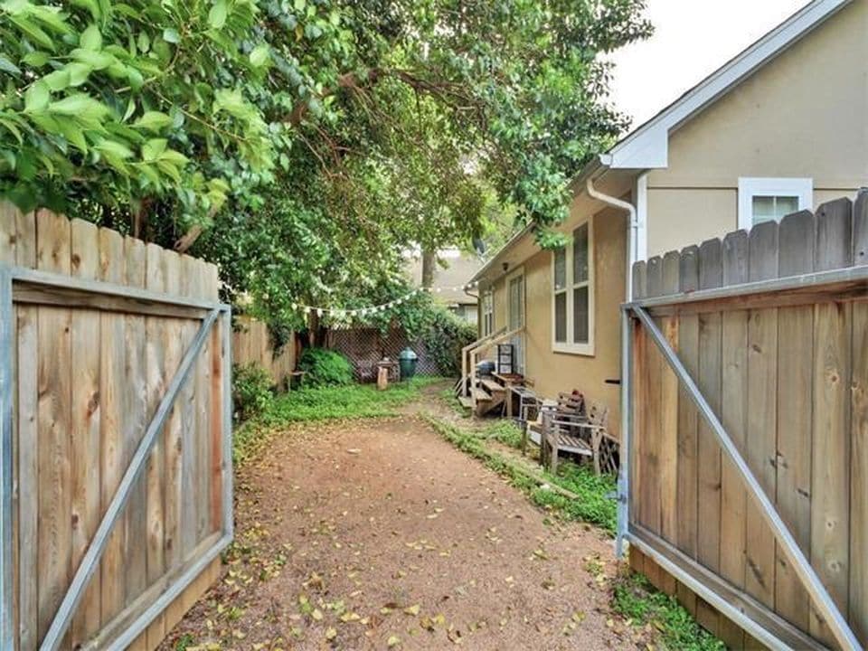 Private parking and fenced yard. - 4302 Duval Street