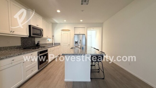 Building Photo - 10732 Quarter Horse Ave