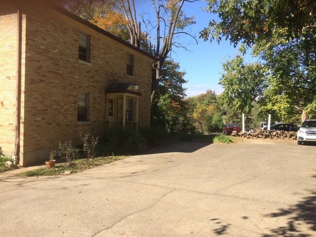 Rear exterior entrance and parking lot - 319 Ridgedale Rd