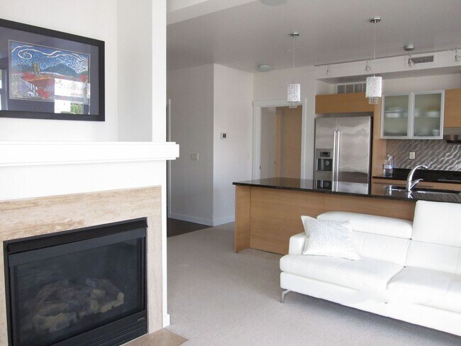 Building Photo - Stunning 2 Bedroom 2 Bath condo, with 2 Parking spots in the heart of vibrant Kirkland for Rent