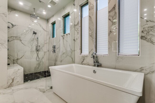 Building Photo - A must see in highly sought after Windsong...