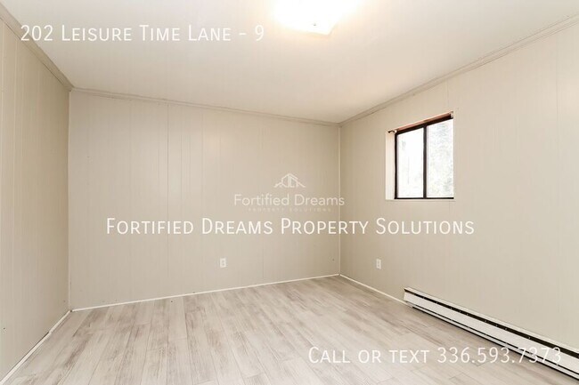 Building Photo - 202 Leisure Time Ln