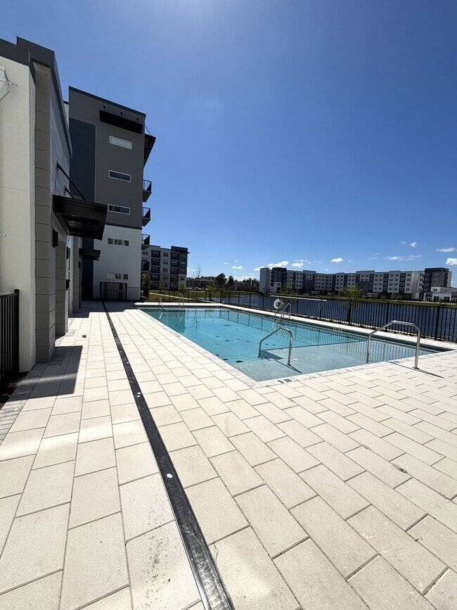 Building Photo - Beautiful and Brand New Apart in Millenia Park Orlando