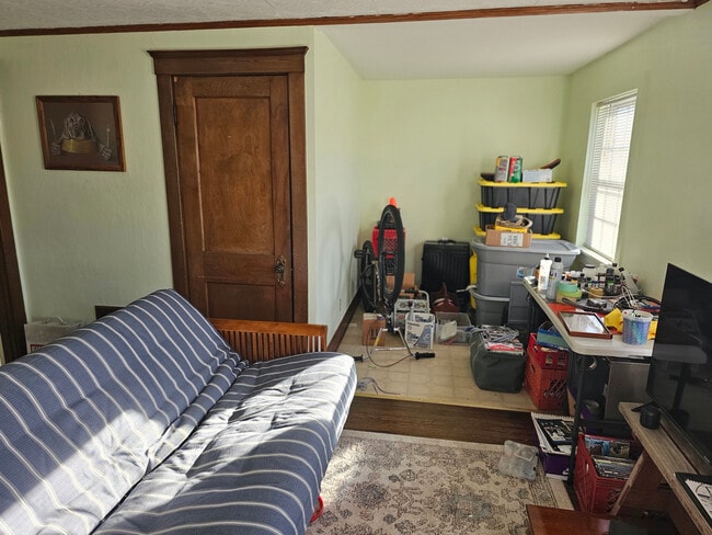 Living Room full of junk - 1 Page St