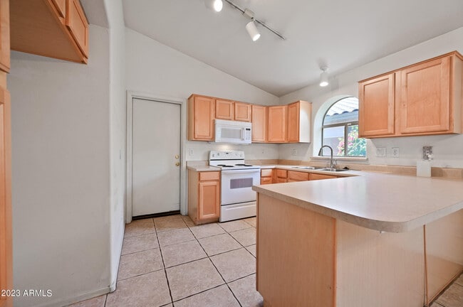 Building Photo - 9312 E Pampa Ave