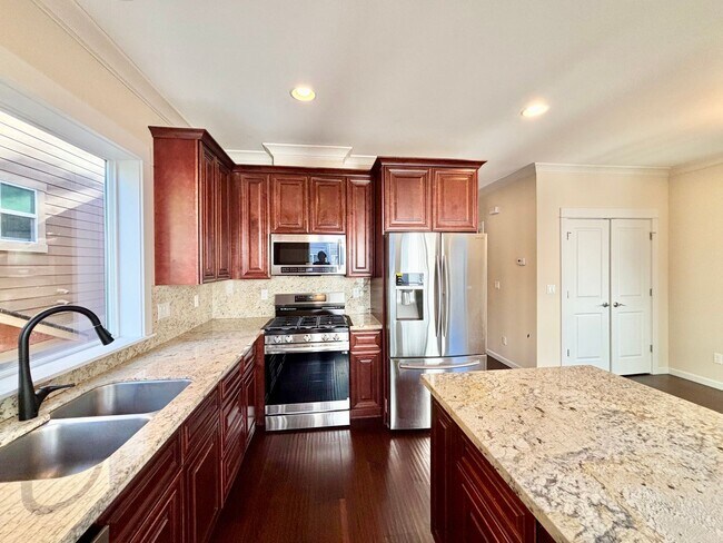 Building Photo - Modern New Construction 4b3b Townhome