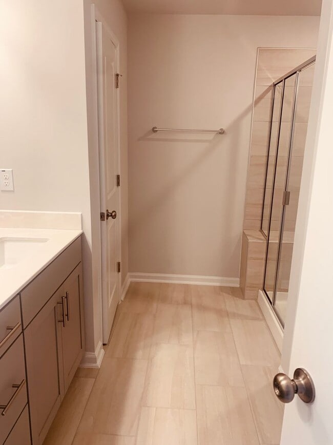 Building Photo - BRAND NEW TOWNHOME! 2 CAR GARAGE. SCREENED IN PORCH. MODERN KITCHEN. OPEN CONCEPT LIVING. BONUS ROOM