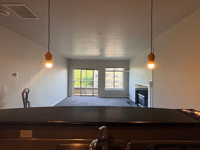 Building Photo - Top-Floor Corner 2BR with Lake Union Views + Garage Parking Included!