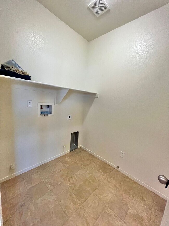 Building Photo - Large Corner Lot Home with Landscaping included!