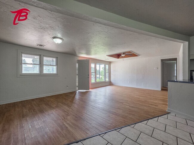 Building Photo - Spacious Split-Level 4-Bedroom Home with T...