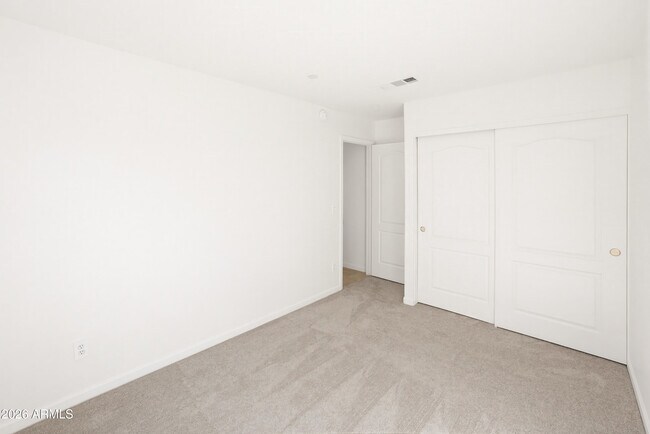 Building Photo - 9321 E Caribbean Ln