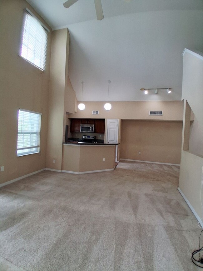 Building Photo - Water view condo with garage in sought after westchase