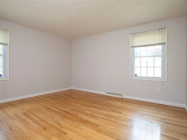 Building Photo - Charming 4-Bed Retreat with Finished Basem...