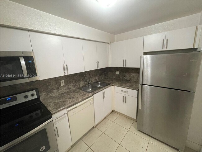 Building Photo - 4235 N University Dr