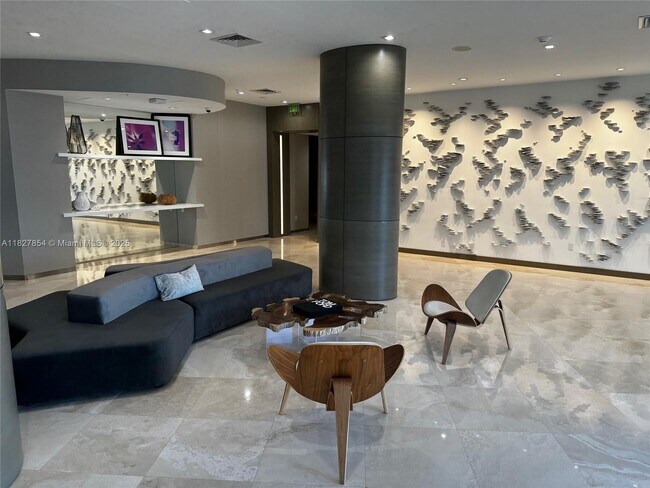 Building Photo - 10275 Collins Ave