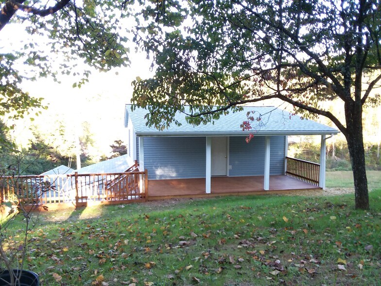Wide deck in back for private entertaining - 2392 Clements Hollow Ln