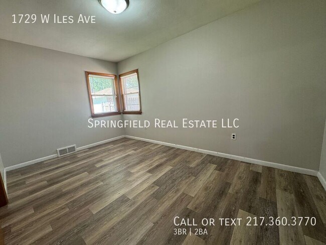 Building Photo - 1729 W Iles Ave
