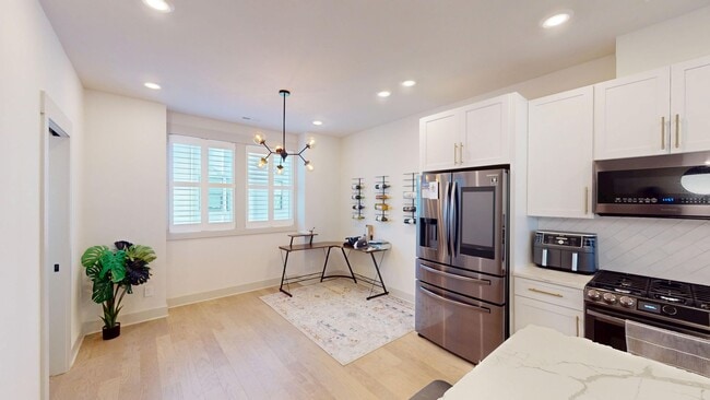 Building Photo - 1025 Wesley Terrace Ave - Elevated townhome living in the heart of Wesley Heights / FreeMoreWest