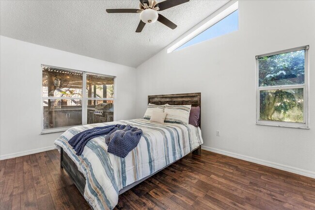 Building Photo - A vibrant 2-bedroom, 2-bathroom tropical retreat designed for both high-energy entertaining and l...