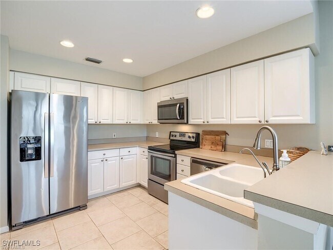 Building Photo - 8986 Greenwich Hills Way