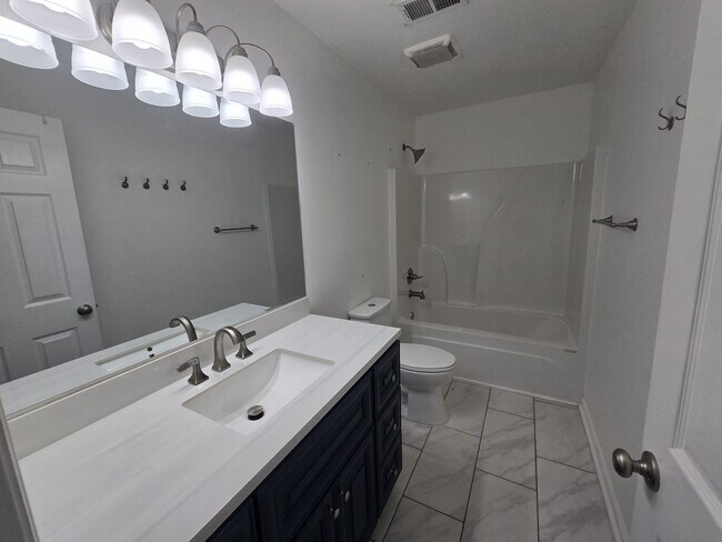 Building Photo - Welcome to The Buchanan Retreat – Modern 4...
