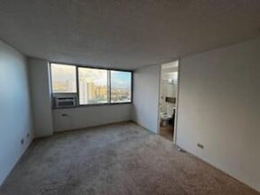 Building Photo - Pearlridge Square Large Studio with AC, Washer/Dryer, and Reserved Parking Stall