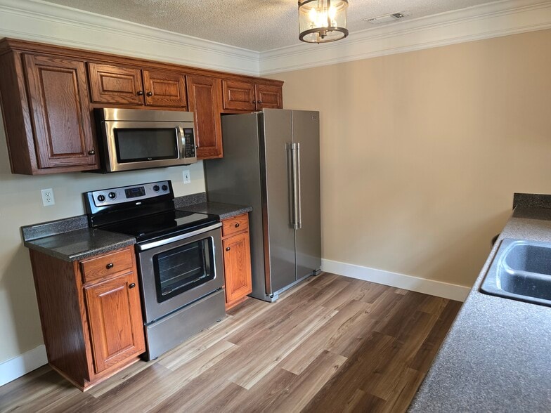 Kitchen with all Stainless Steel Appliances - 2065 Pinemount Blvd