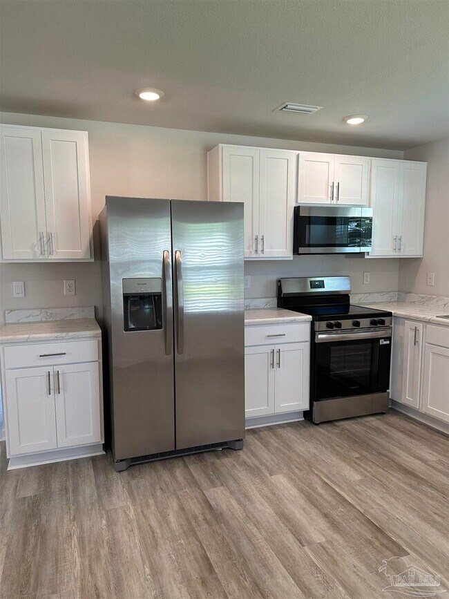 Building Photo - 6497 Firefly Dr