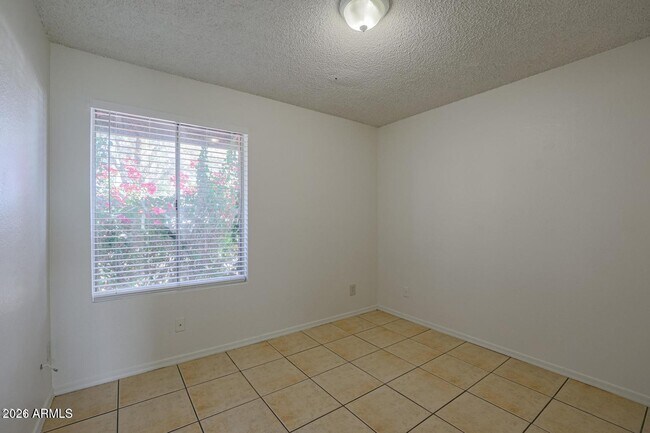 Building Photo - 3020 N 87th Ave