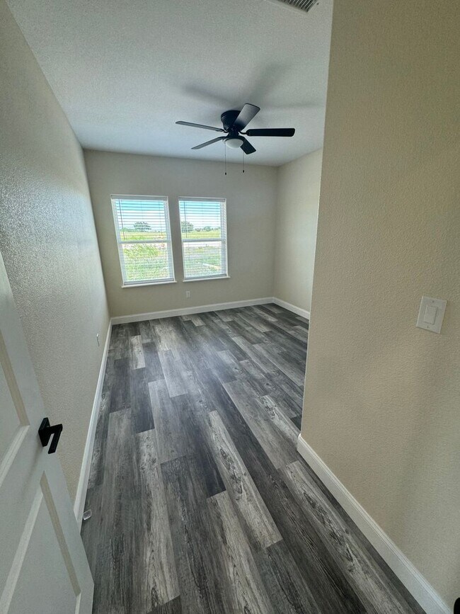 Building Photo - 4/2/2 COMING SOON.....Modern Townhome with private fenced yard! HIGH CEILINGS PETS WELCOME